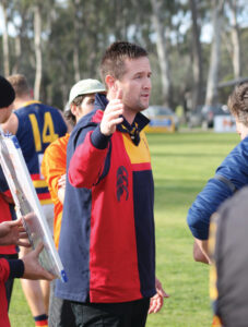 Callow signs back on