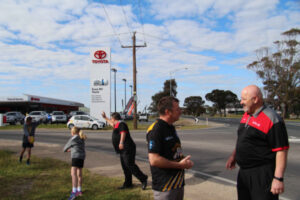 Tigers march with AFL stars