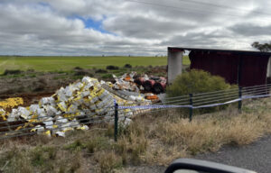 B-double rolls, driver hurt