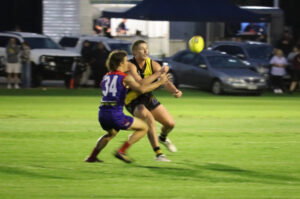 Tigers win hard slog in rain