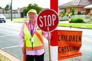 ‘Lollypop lady’ urges caution around schools