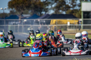 Karts rev around the track