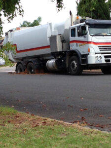 Road gives way under truck