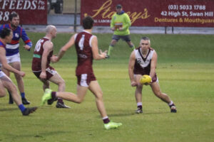 Swans fly to first win