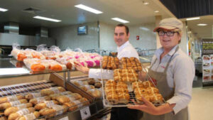 Supermarkets have buns in the oven