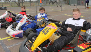 Three young guns having a go