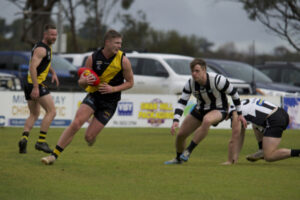 Top-three Tigers tame Magpies