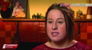 Baby Sophie embraced by Swan Hill