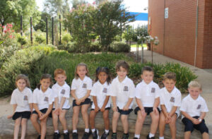 Schools back, teacher honoured