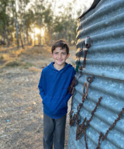 Young sculptor transforms corrugated iron water tank for TWIG show