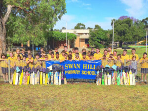 Students put out their bats