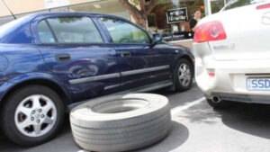 LUCKY ESCAPE: Runaway truck tyre just misses pedestrians