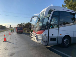 Swan Hill bus rolls across highway