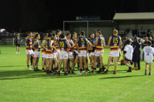 Full forward kicks nine as Kangas shine under lights