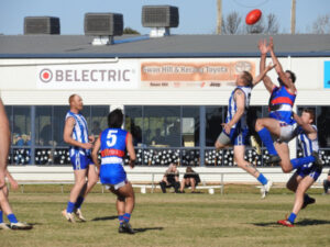 Roos victorious over Dogs in a cliffhanger