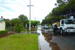 Water burst floods street