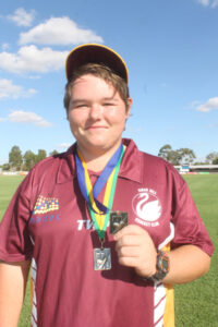 Youngster spins medal in third game