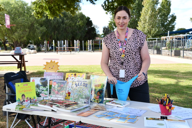 Little gardeners play in the sun